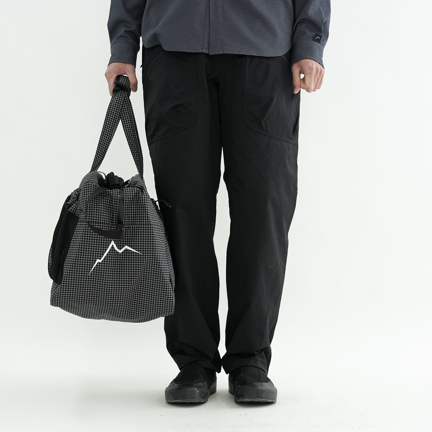 Race Bag (cayl grid) | Black