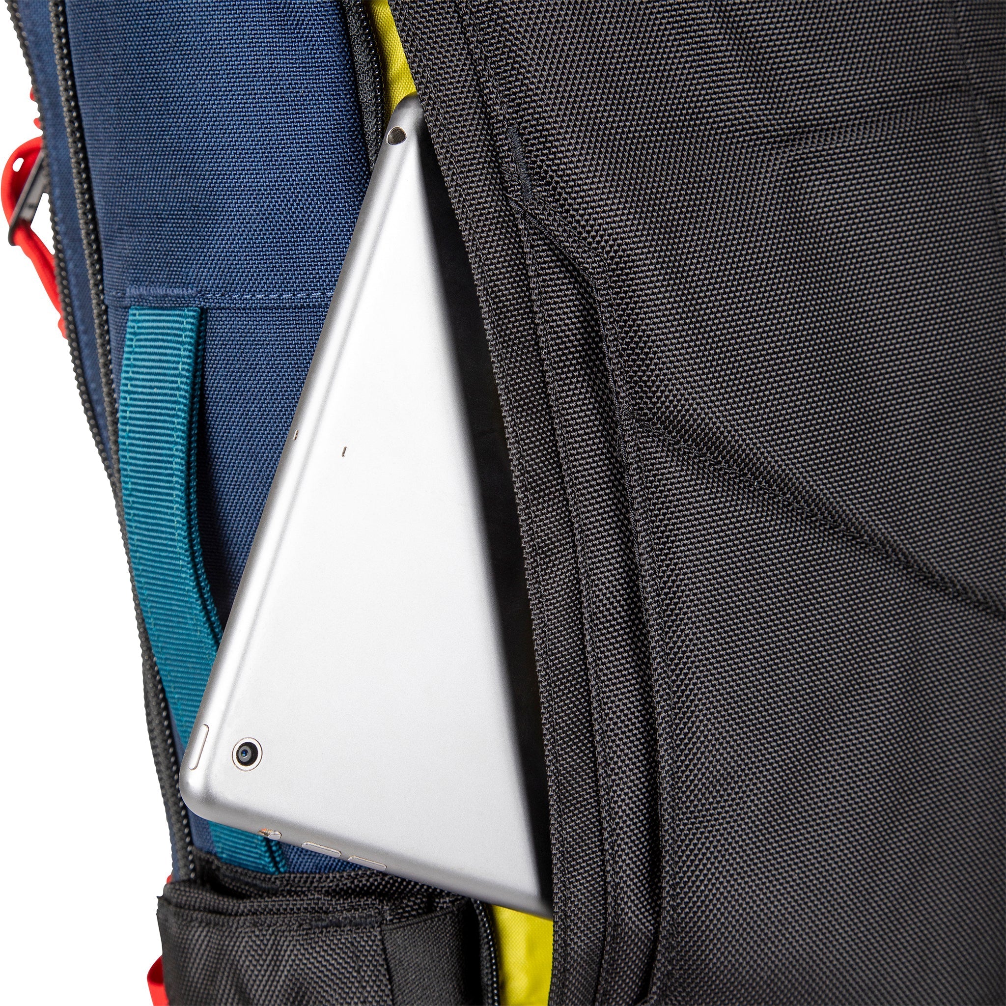 External access laptop sleeve on Topo Designs Global Travel Bag 30L Durable Carry On Convertible Travel Backpack.