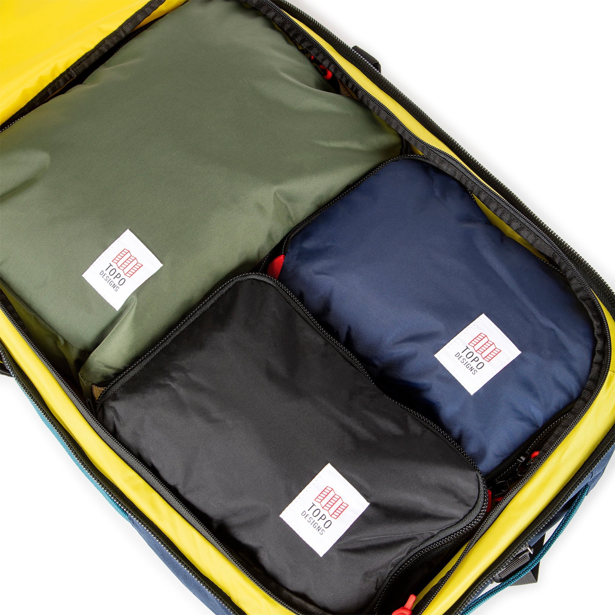 Pack Bags inside Topo Designs Global Travel Bag 40L Durable Carry On Convertible Laptop Travel Backpack.