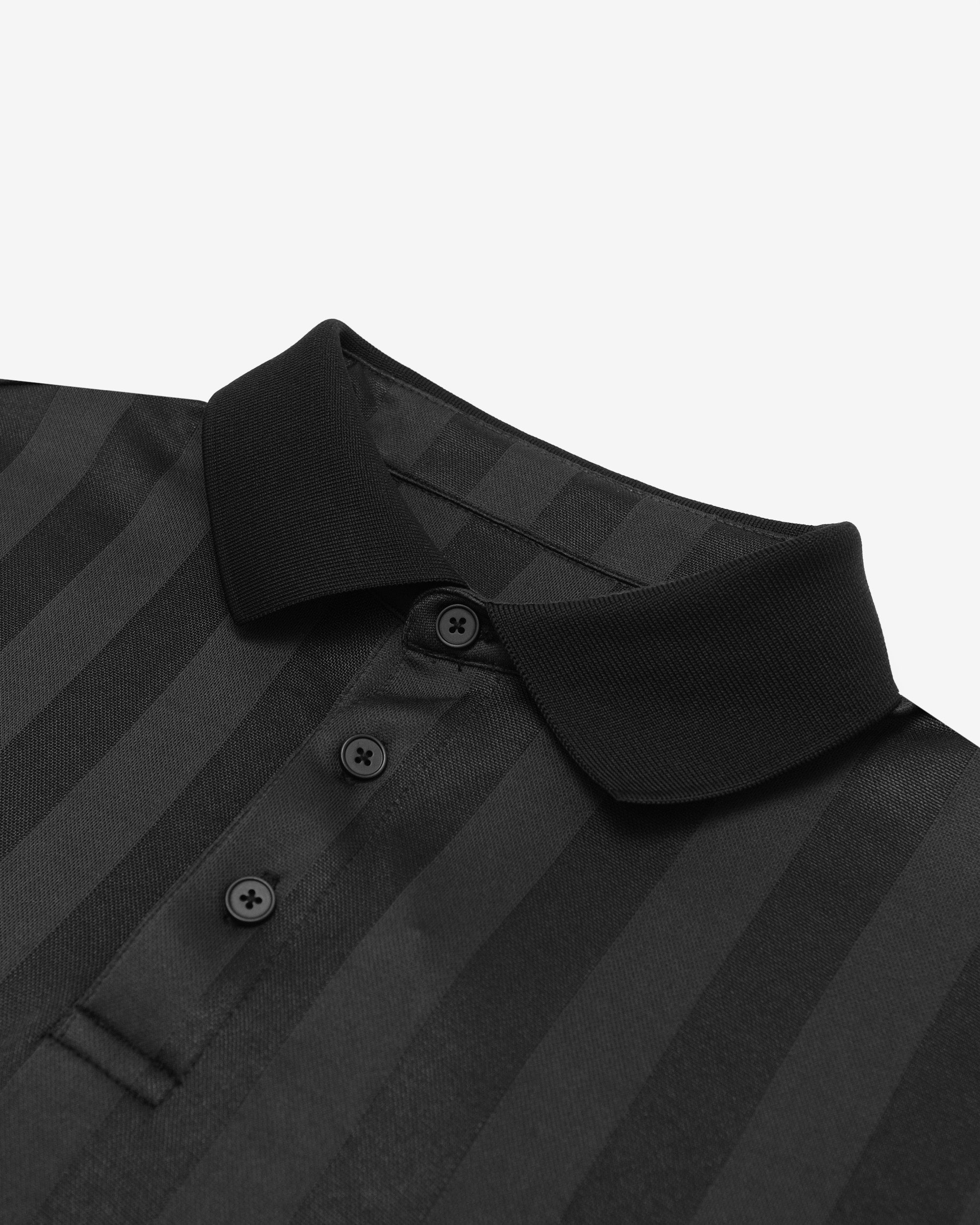 Close-up of a black striped shirt with a collar on a white background
